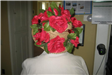 Woman Wearing Hat with Red Flowers, Back View