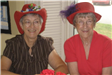 Women Wearing Two Red Hats
