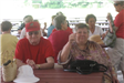 Senior Man and Woman Sitting at Picnic Table