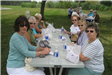 Group of Women Sitting with Food 4