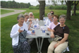 Group of Women Sitting with Food 5