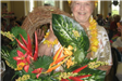 Woman Holding Wreath with Flowers