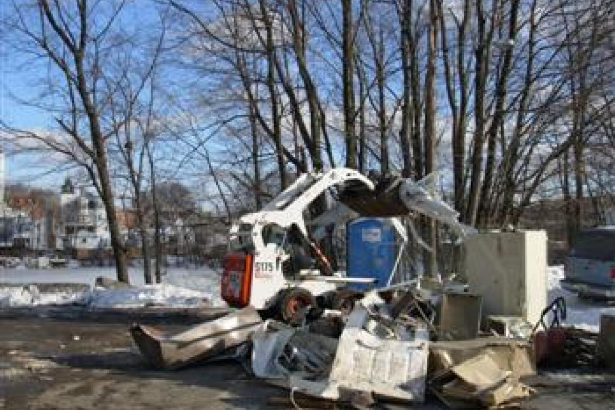 Excavator Moving Junk