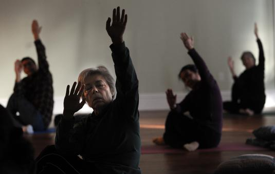 Stretching - Photo by Allan Jung for Daily News & Wicked Local