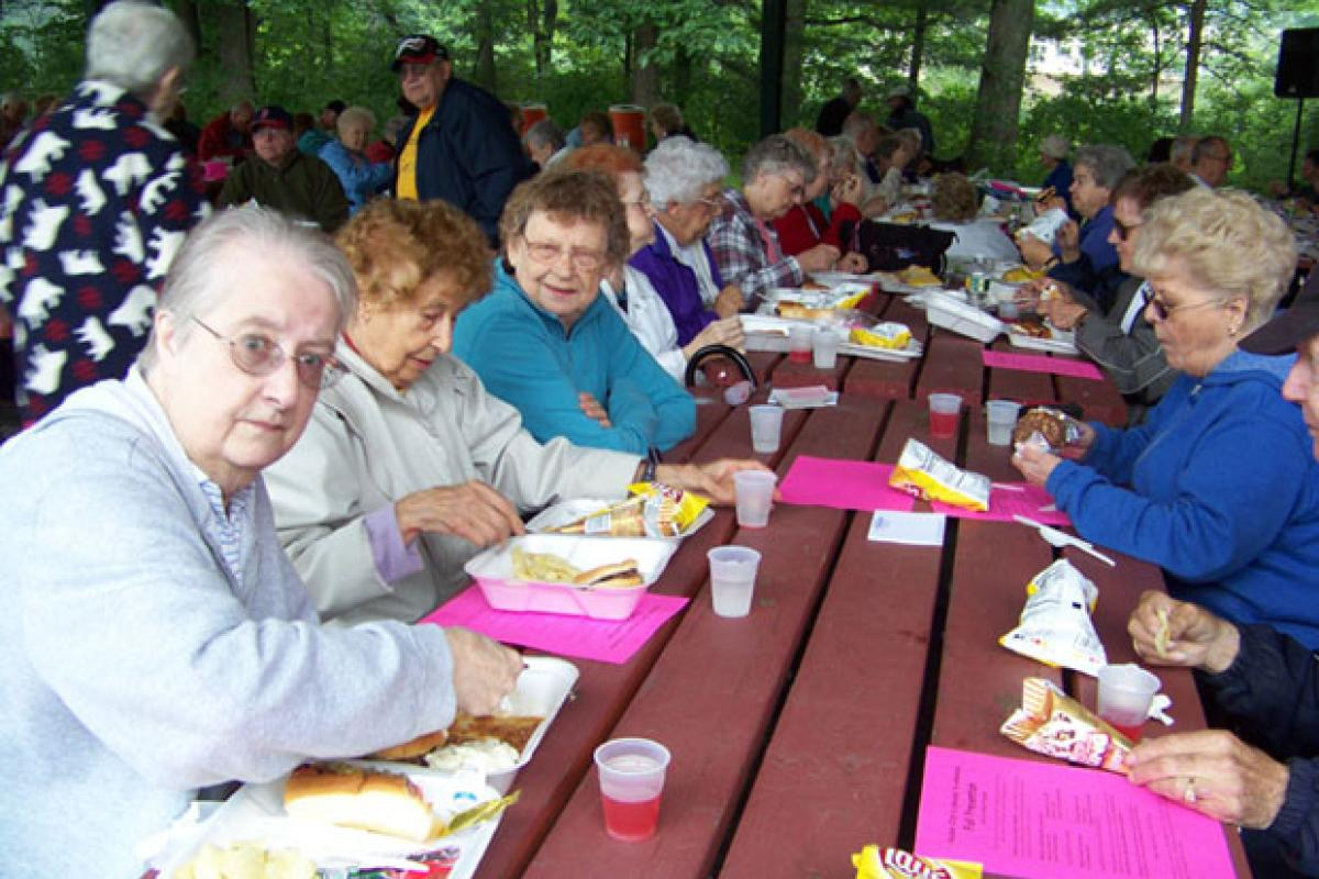Seniors Eating at an Outdoor Picnic 4