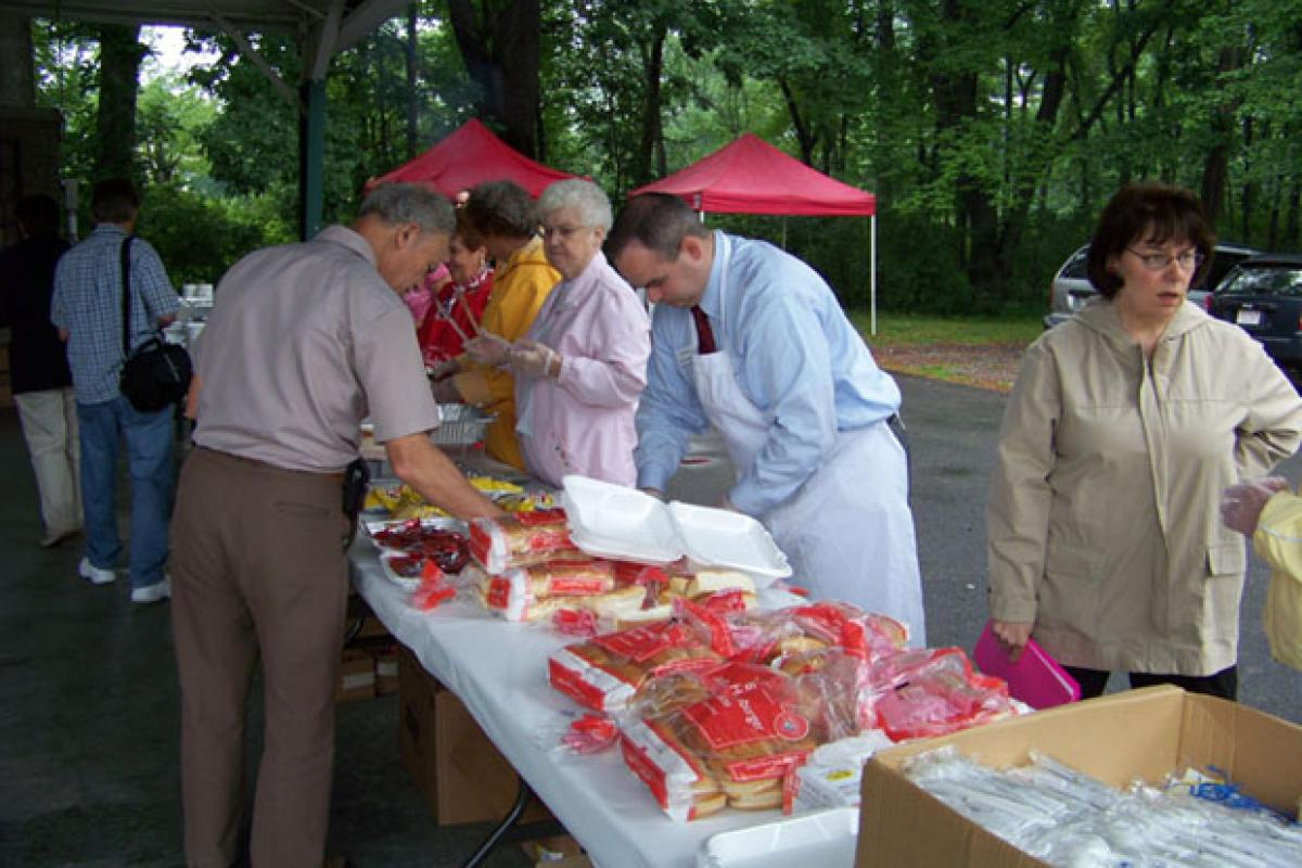Seniors in Line Getting Food