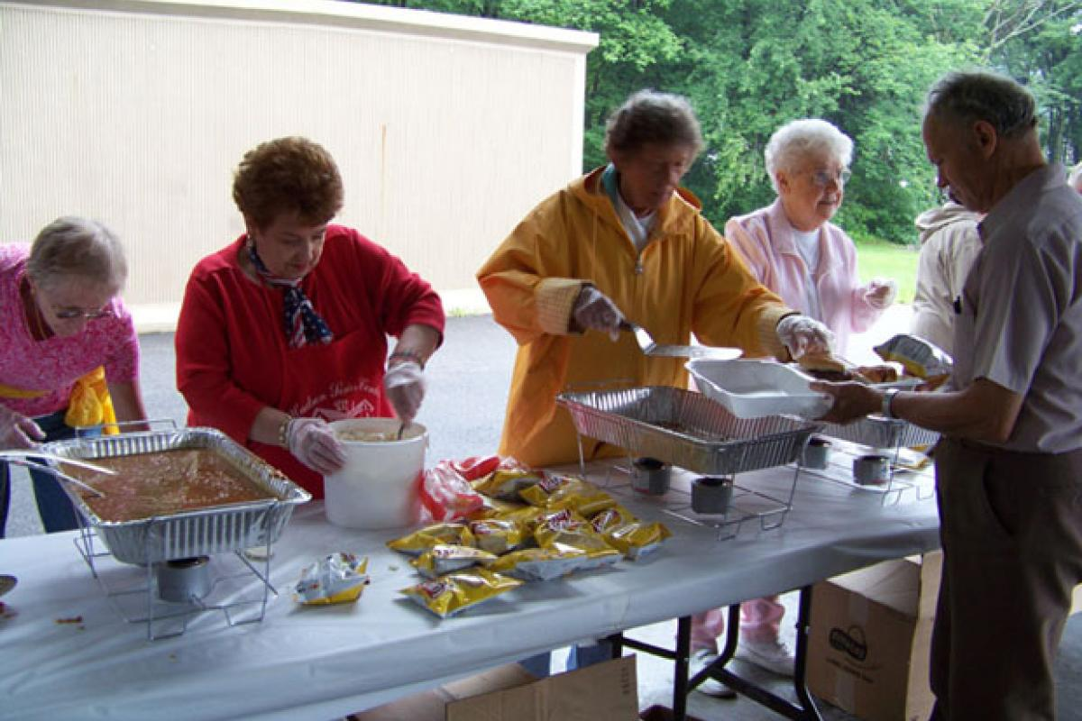 Seniors Being Served Food
