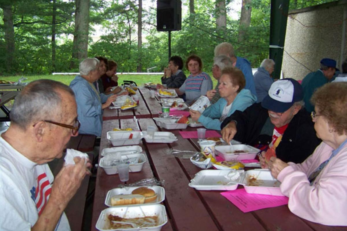 Seniors Eating at an Outdoor Picnic 6