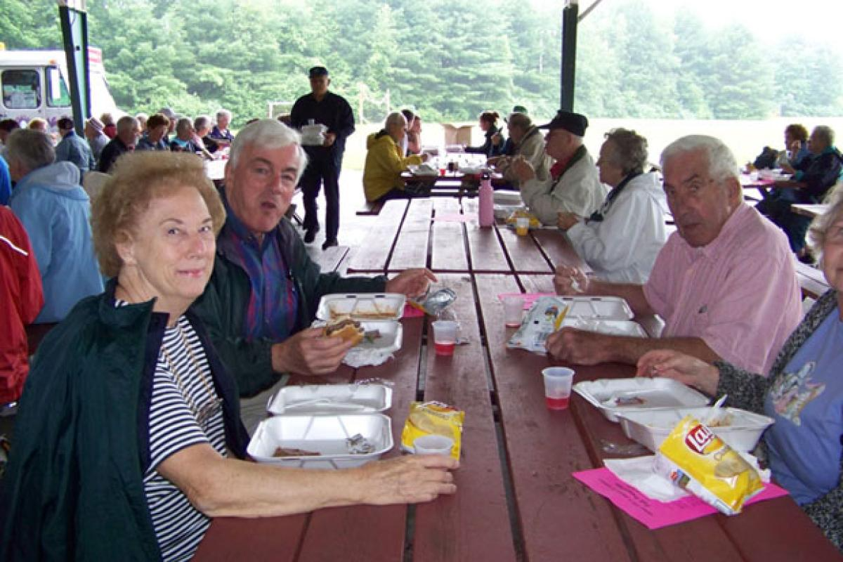 Seniors Eating at an Outdoor Picnic 8