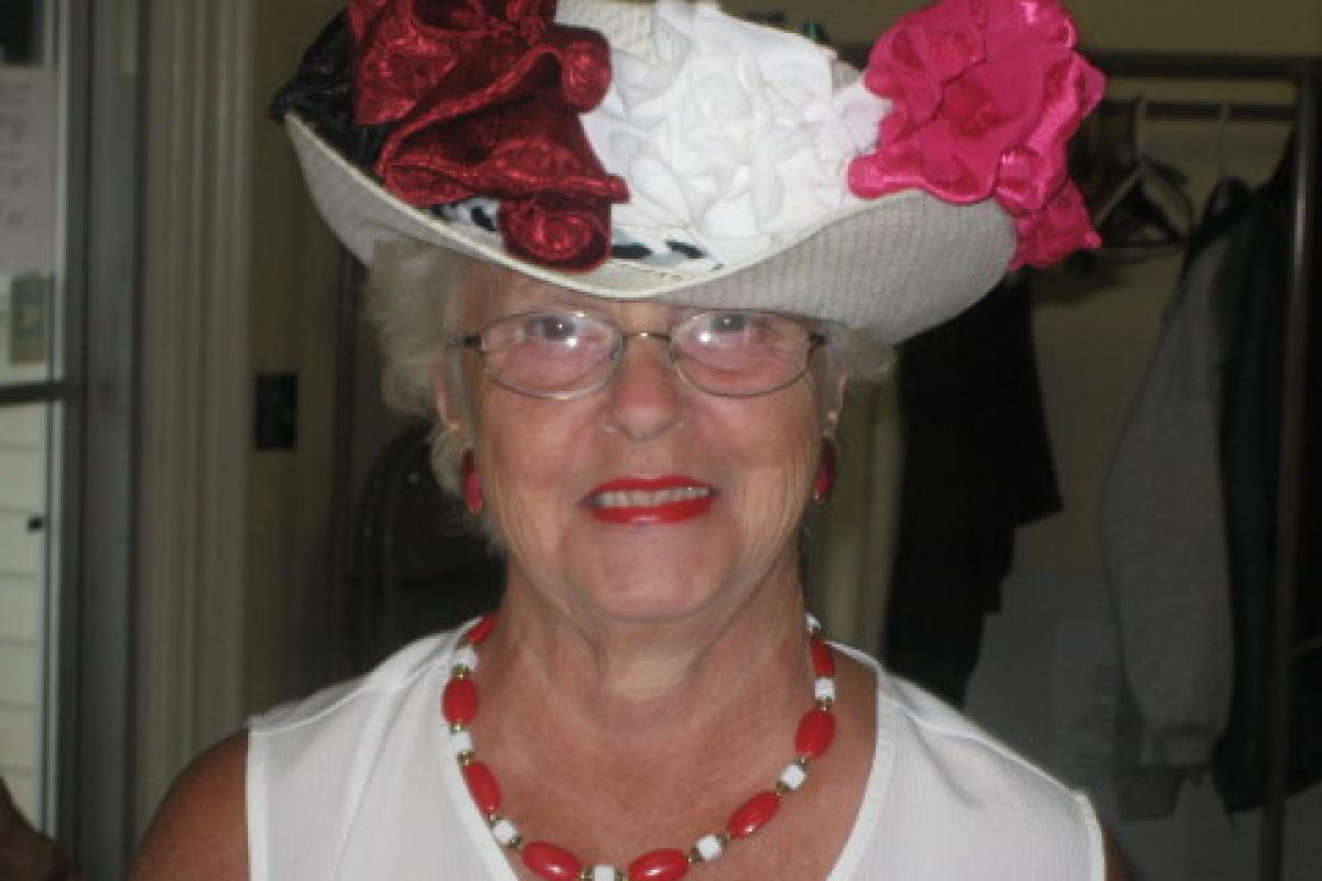 Woman Wearing Red and White Hat
