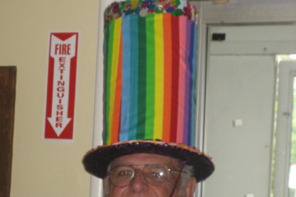 Man Wearing Rainbow Hat
