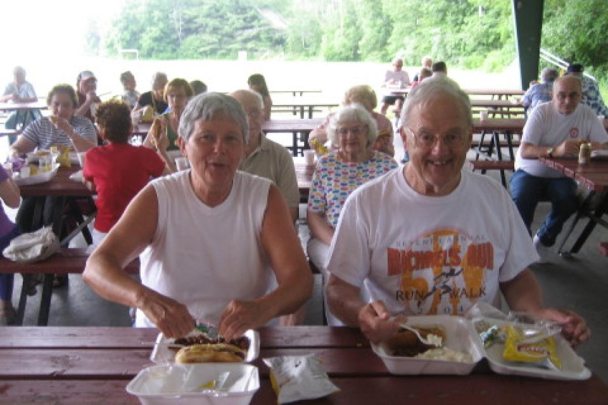 Senior Woman and Man Eating