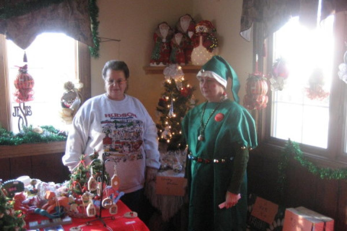Two Senior Woman, One Dressed as an Elf