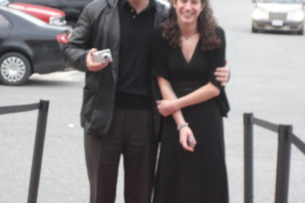 Woman and Man Dressed in Black on Red Carpet