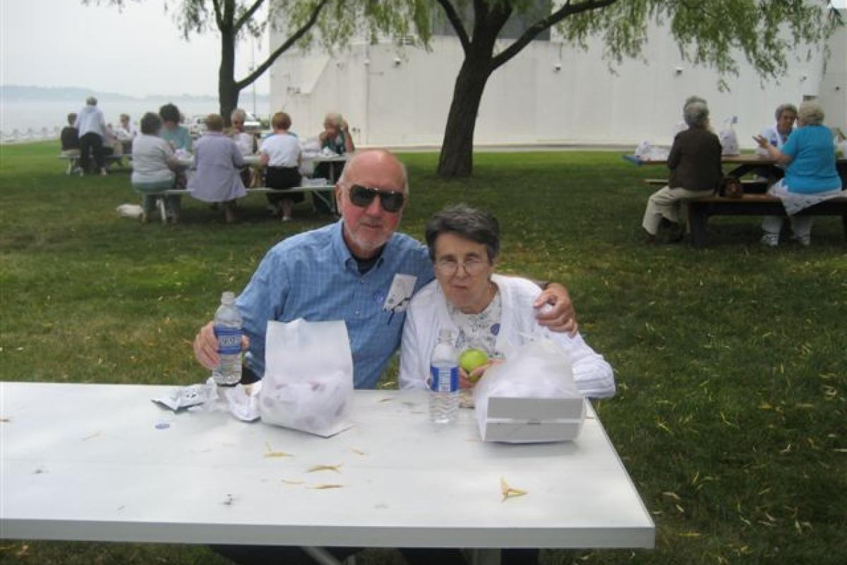 Two People Sitting and Eating