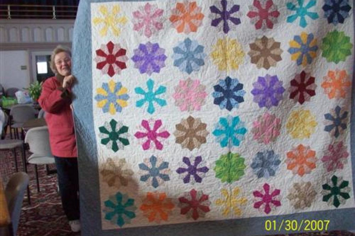 Woman Holding Flower Quilt