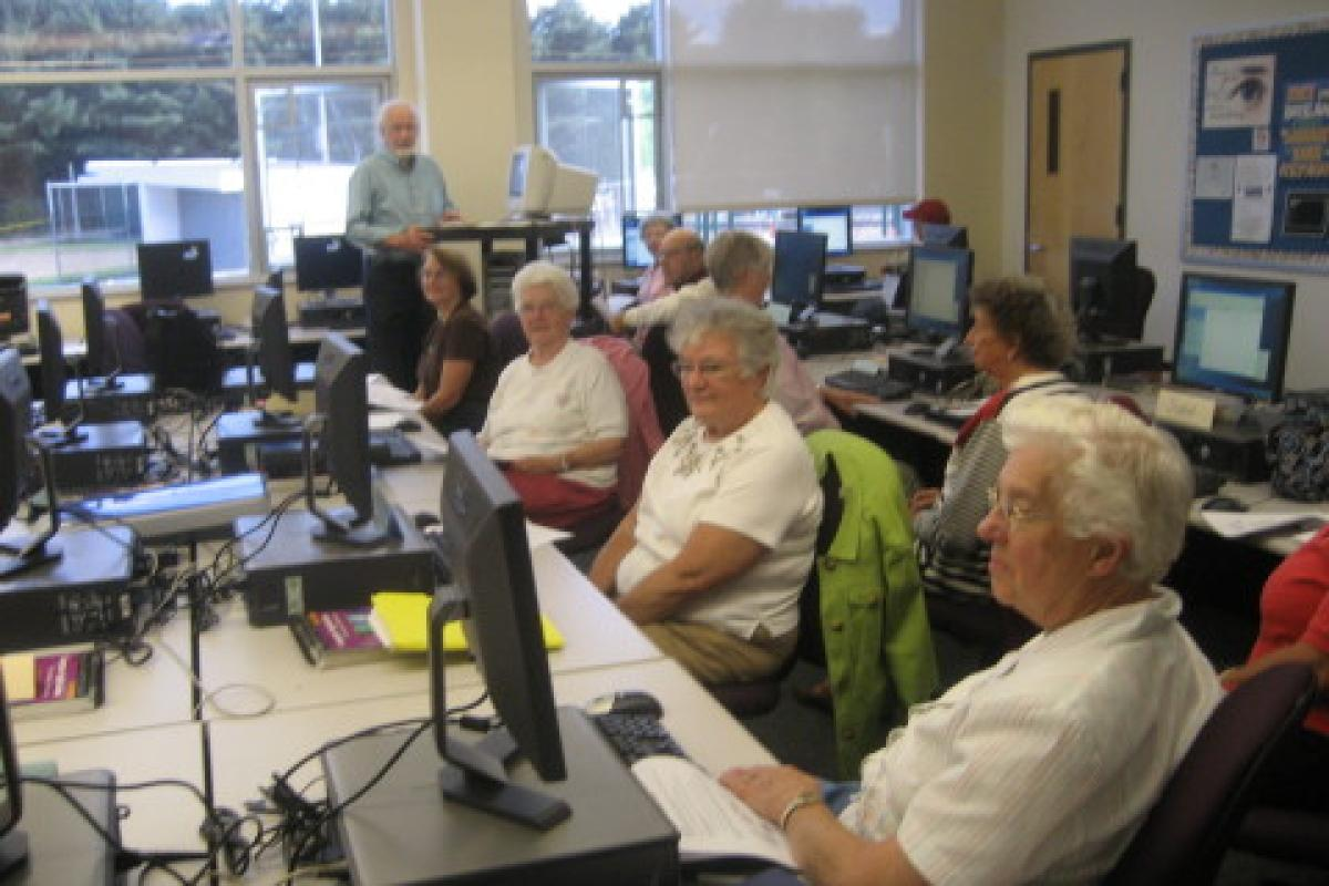 Group Sitting at Computers During Instruction