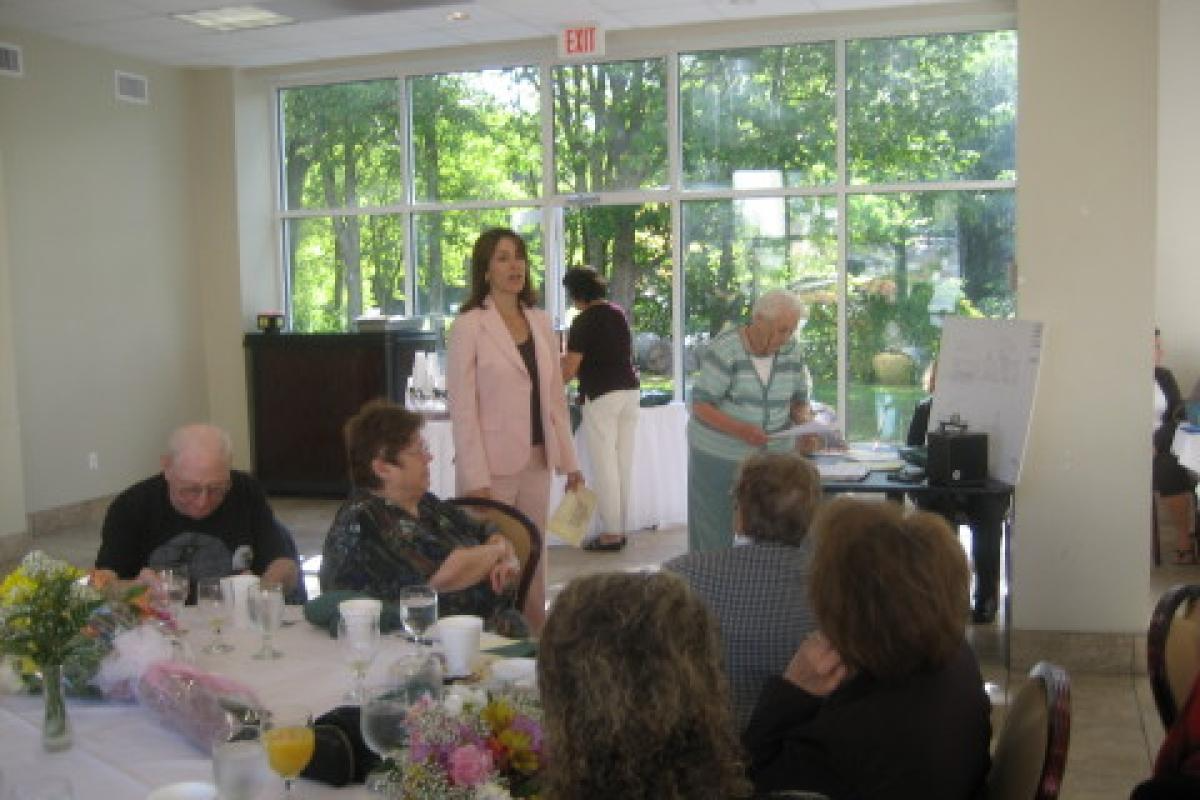 Woman Addressing the Room
